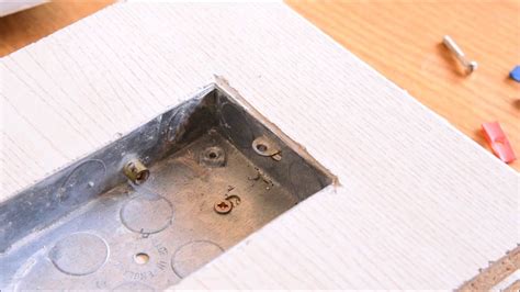 how to repair an electrical outlet box|electrical box screw hole broken.